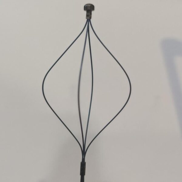 Physician using a Nitinol stone retrieval basket during minimally invasive urological procedure with fluoroscopic guidance.